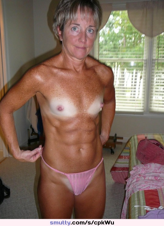 #granny #gramma #mommy #milf #blueeyes #shorthair #grayhair #smallboobs #muscular #wow #shape #abs #tanlines #pinkpanty