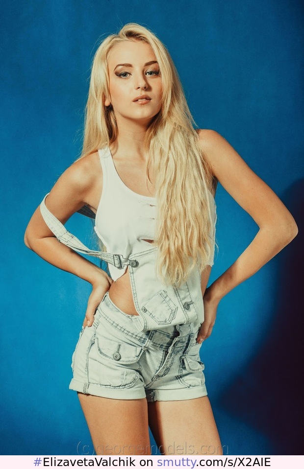#ElizavetaValchik #petite #blonde #russian #model #whitetop #midriff #overalls #posing #handsonhips #GeorgeModels