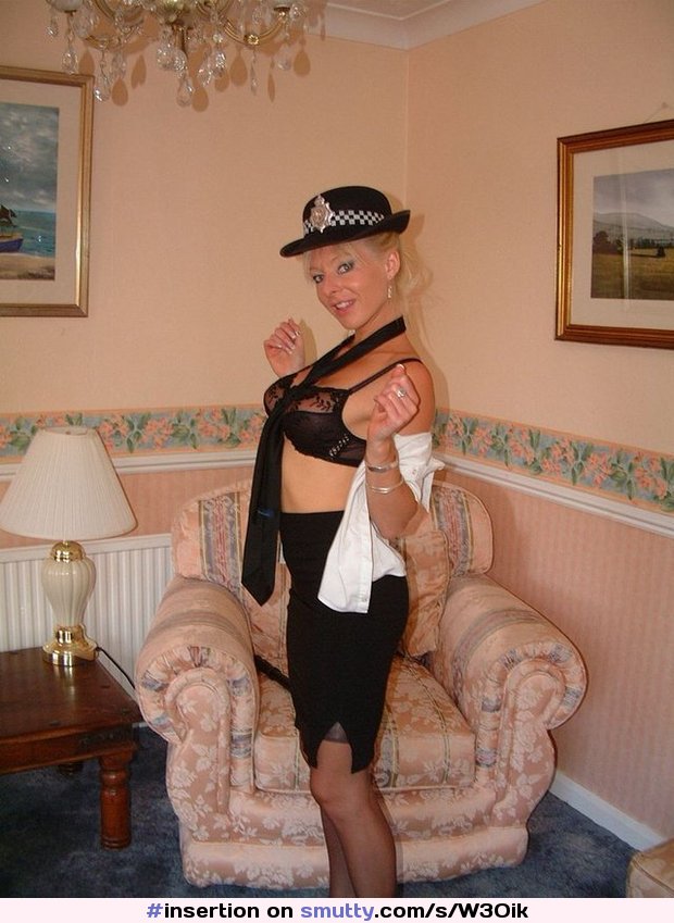 #MichelleRiding#British#English#uniform#police#policewoman#stocking#heels#baton#blonde#blueeyes,#tie#hat#lingerie#garterbelt#insertion