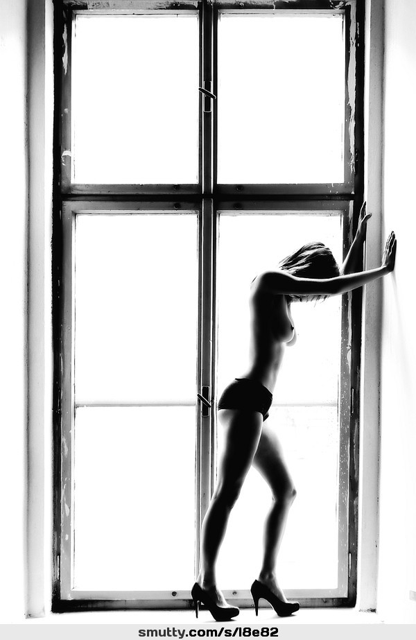 #BlackAndWhite #ArtisticNude #artnude #window #topless #heels #handsonwall #perkytits #perkyboobs #Erotic