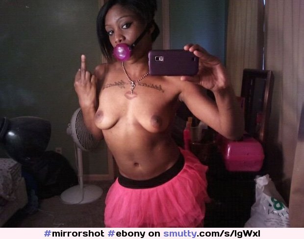 An image by Spectator: #ebony #ebonybabe #ebonyslut #tutu #tattoo #gagged #flipoff #selfshot #Selfpic #selfie #mirrorshot