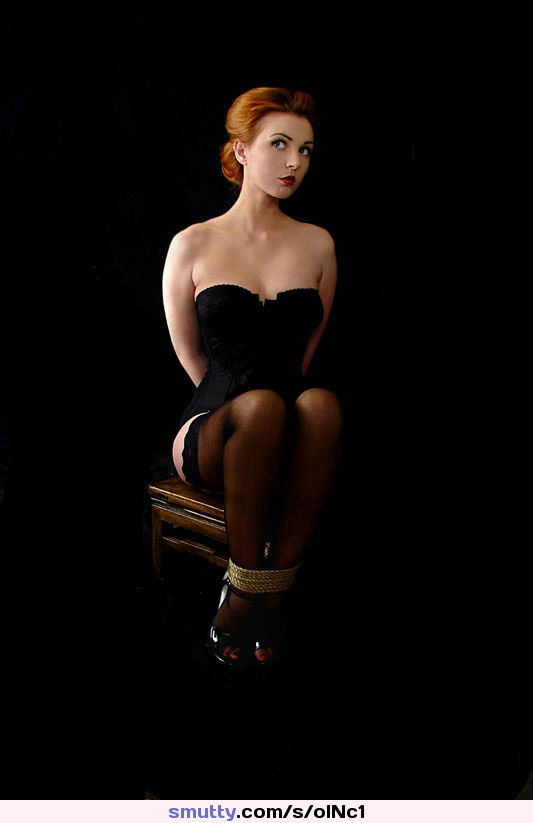#demure #bondage #redhead #corset #stockings #tied #armsback #ropebondage #bdsm #lipstick #glamour