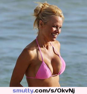 Pamela Anderson hard nipples under pink bikini