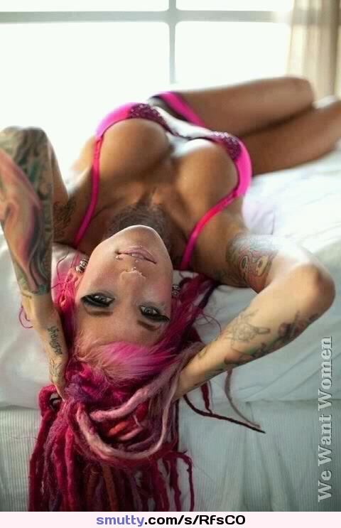 #upsidedown #titsup #bigtits #bra #panties #pinkhair #dyedhair #dreadlocks #nosering #labret #tattoos #eyelashes #fuckmelooks #lying #bed