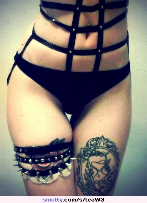#flatstomach #blackpanties #garterbelts #spikes #chains #tattoo #gap #hips #thighs #navelstud