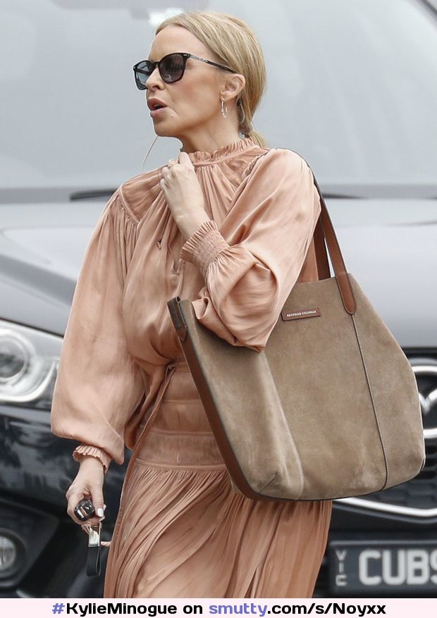 Kylie Minogue in a Flowing Peach Coloured Dress 02/12/2021 #KylieMinogue