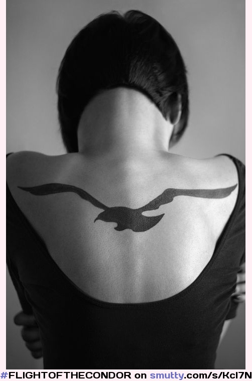 #FLIGHTOFTHECONDOR #BlackAndWhite #girl #brunette #seenfrombehind #shorthair #tattoo #bird #CLRBF #CLRBBlackAndWhite