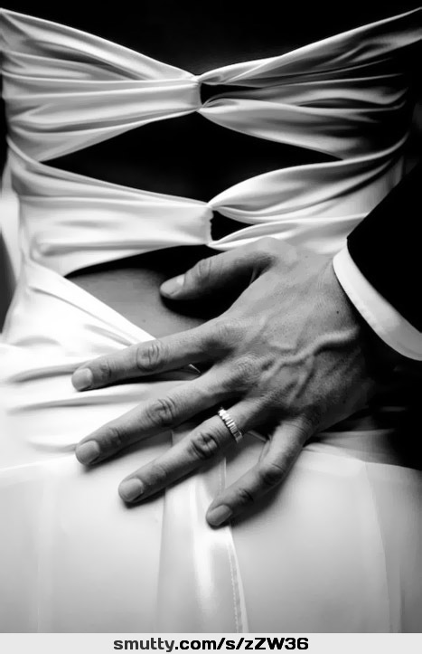 JUST ONE TOUCH AND SHE WILL KNOW #BlackAndWhite #manandwoman #womansback #dress #manshand #weddingring #CLRBF #CLRBBlackAndWhite