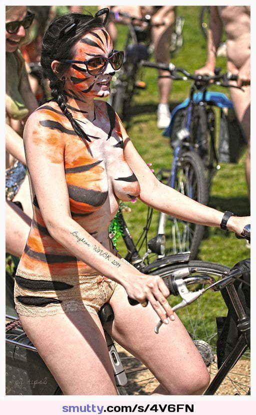#WNBR #public #publicnudity #outdoor #bike #bicycle #cyclerotica #smile #smiling #topless #bodypaint #sunglasses #tigress
