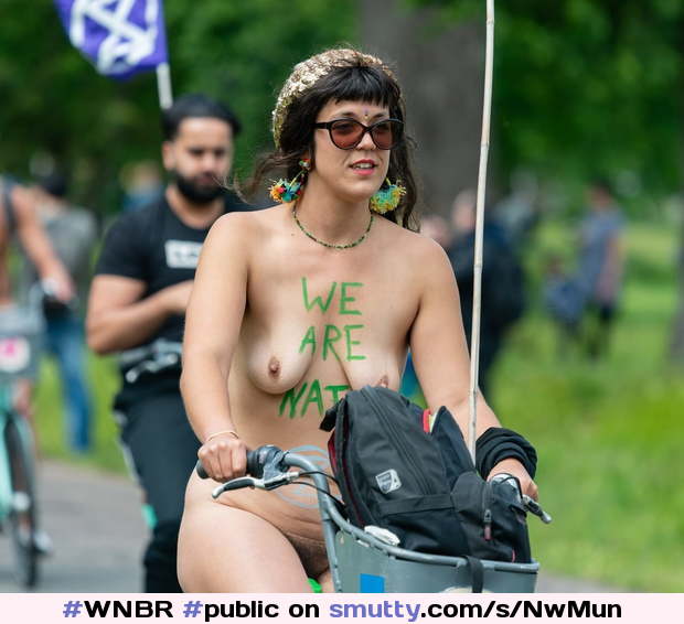 #WNBR #public #publicnudity #outdoor #bike #bicycle #cyclerotica #smallboobs #smile #smiling #sunglasses #tanlines #bodypaint