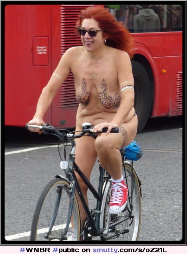 #WNBR #public #publicnudity #outdoor #bike #bicycle #cyclerotica #smallboobs #smile #smiling #bodypaint #redhead #bodypaint #chucktaylors
