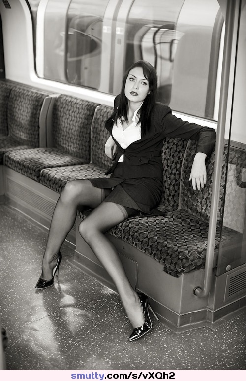 #sexy #brunette #workinggirl in the #subway #stockings #legs #heels #miniskirt #iwanttofuckher