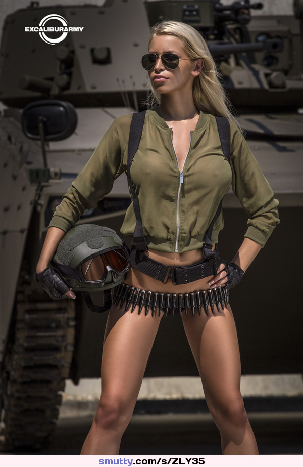 #blonde#nobra#seethru#seethrough#outdoor#bullets#bulletbelt#sunglasses#helmet#militarybitch#uniform#armor#daylight#attitude#armychick#armyba